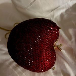 Brand new, never used! red apple-shaped design adorned with sparkling sequins.